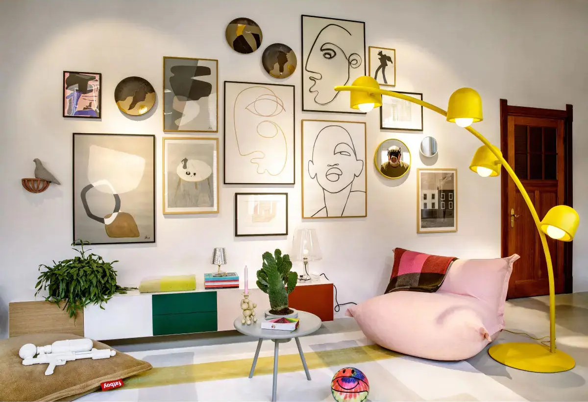 Statement lighting from Table Lights showcasing the Fatboy Big Lebow floor lamp in a modern living room with a Bonbaron lounge chair.