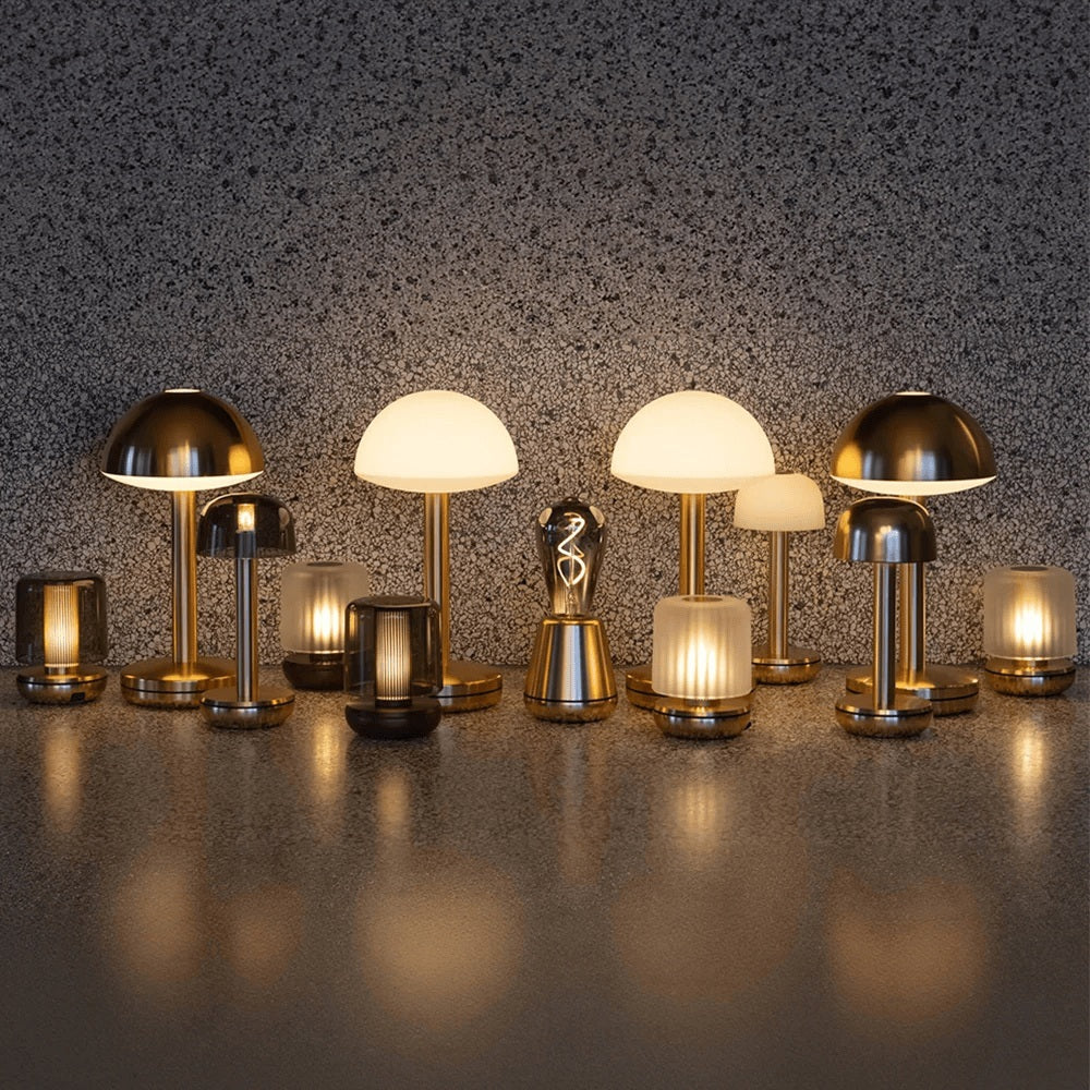 Collection of vintage-inspired gold table lamps from Humble Lights, thoughtfully arranged to showcase a variety of heights and designs.